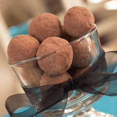 Chocolate truffles with cocoa powder in parfait glass