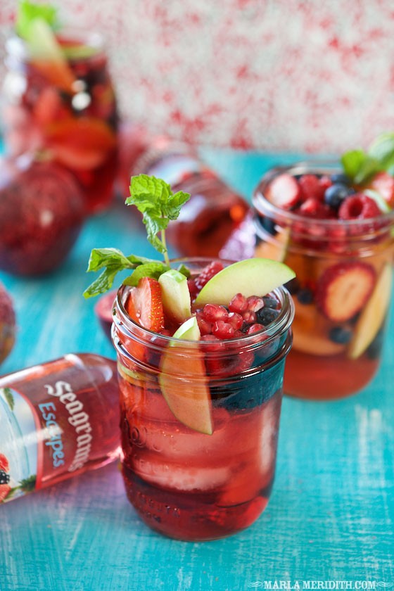 We love this Fruity Sangria Punch for summer entertaining! MarlaMeridith.com