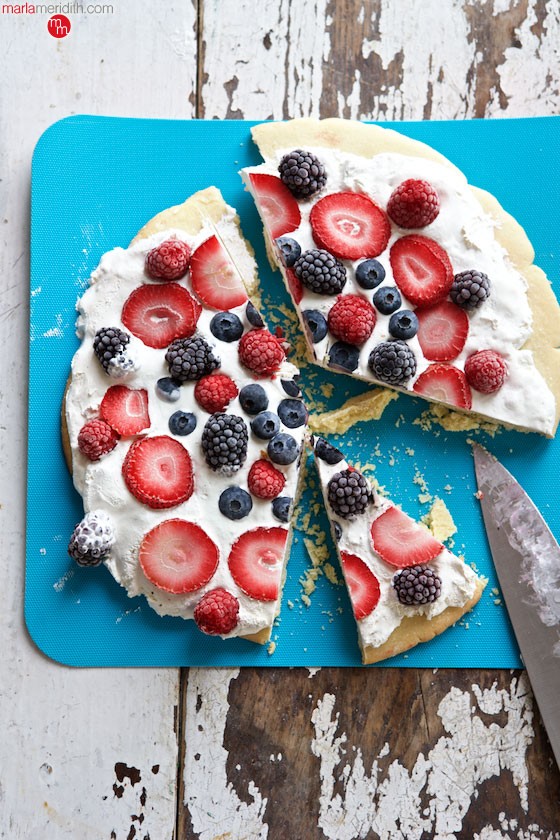 July 4th Berry Dessert Pizza | A giant sugar cookie loaded with whipped cream & fresh berries | MarlaMeridith.com ( @marlameridith )