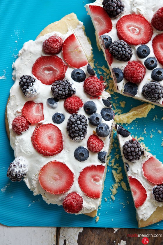 July 4th Berry Dessert Pizza | A giant sugar cookie loaded with whipped cream & fresh berries | MarlaMeridith.com ( @marlameridith )