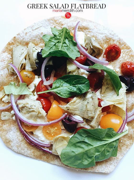 Greek Salad Flatbread #recipe Instead oaving your favorite #salad in a bowl serve it pizza style! MarlaMeridith.com