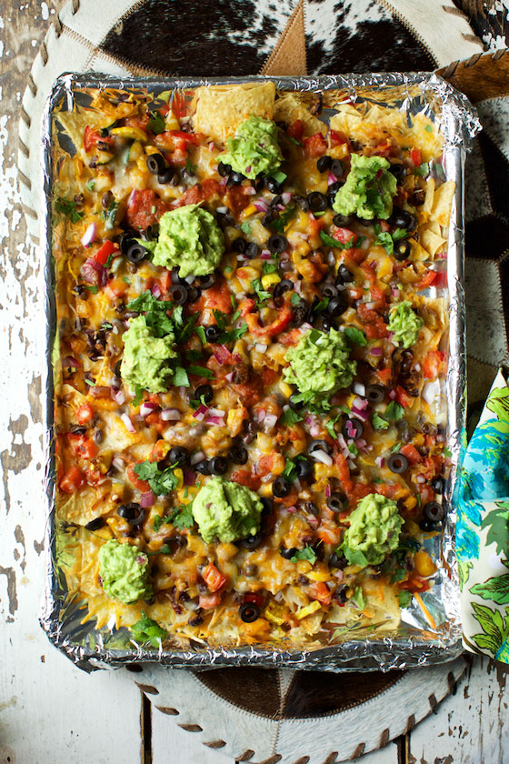Vegetarian Sheet Pan Nachos recipe, the best nachos you will ever eat! Serve for family dinners and Cinco de Mayo. MarlaMeridith.com ( @marlameridith )