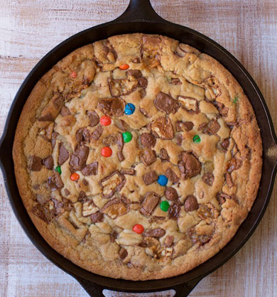 What to do with all that leftover Halloween candy? Make a GIANT Skillet Cookie with it! Get the recipe on MarlaMeridith.com #recipe #cookies #halloween