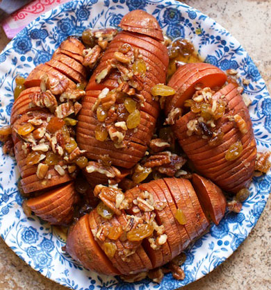 Hasselback Sweet Potatoes with Maple, Pecans & Golden Raisins are the best side for Thanksgiving! MarlaMeridith.com #recipe #sweetpotato #thanksgiving