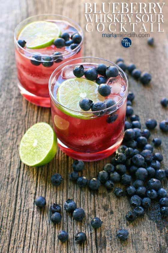 This Blueberry Whiskey Sour cocktail recipe will be a BIG hit at your next celebration or happy hour! MarlaMeridith.com #cocktail #recipe