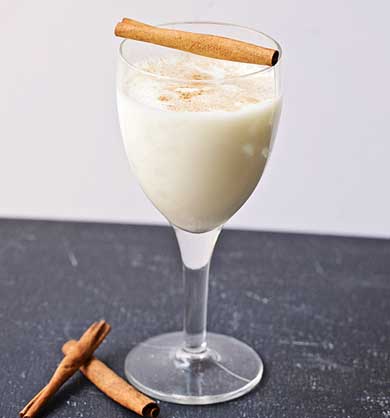 This Milk & Honey Cocktail is warming and delicious on a cold winters day. Great for apres ski too! MarlaMeridith.com #recipe #cocktail
