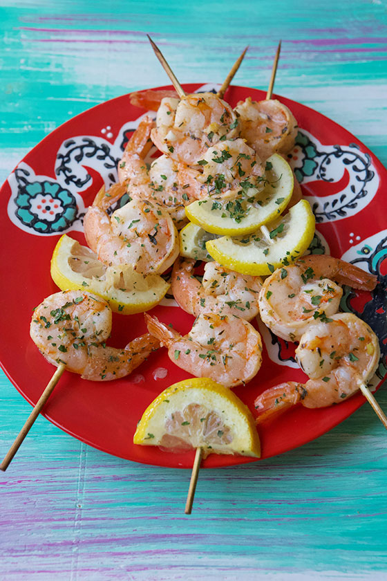 Make these simple & delicious Lemon Garlic Shrimp Skewers for your next cookout! MarlaMeridith.com
