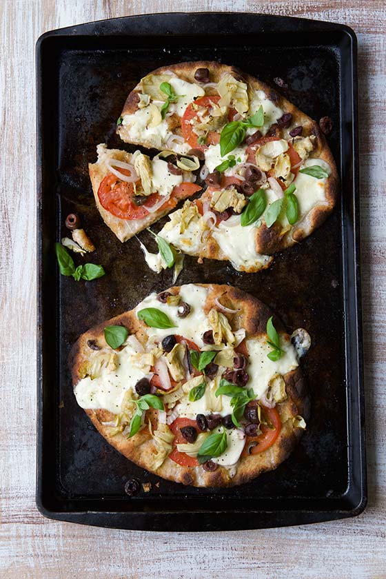 Make the most of summer produce with these Easy Tomato Basil Flatbread Pizzas ~ Get the recipe on MarlaMeridith.com
