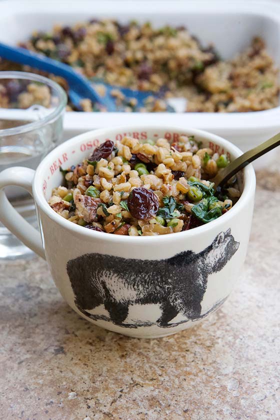 This Vegan Farro Salad with Baby Spinach, Peas & Toasted Pecans is a full, hearty meal, but also weighs in light and easy for summer. Get the recipe on MarlaMeridith.com