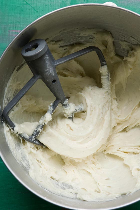 This is our absolute favorite Ultimate Cream Cheese Frosting recipe for cupcakes, cake & frosted cookies. Comes together in just 3 minutes! MarlaMeridith.com
