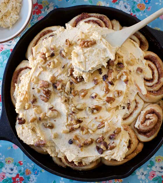 Cast Iron Skillet Cinnamon Rolls with Maple Pumpkin Cream Cheese Frosting. Buy the cookbook HIGH ALPINE CUISINE for the recipe! marlameridith.com
