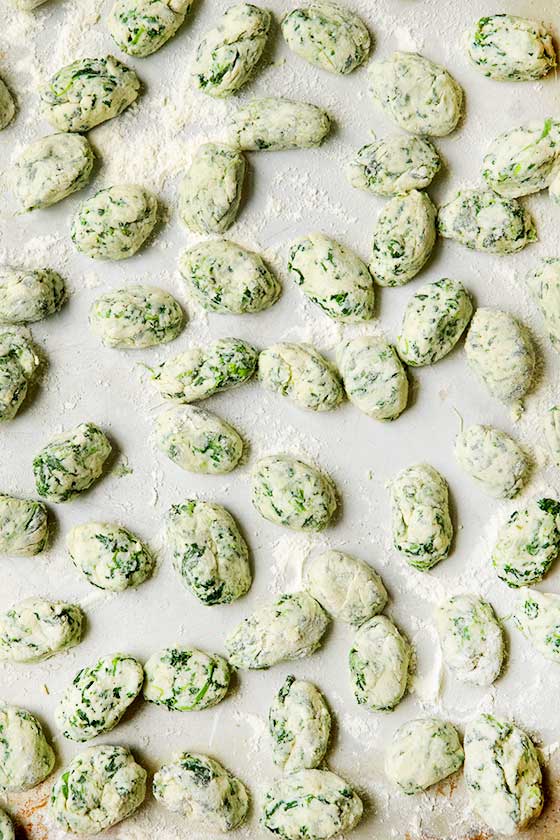 We love this easy and delicious Spinach Ricotta Gnocchi recipe. Top with melted butter and crispy shallots for a healthy anytime meal. Serve as a main course, appetizer or side dish. MarlaMeridith.com