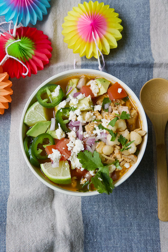 Posole or Pozole is a traditional soup or stew from Mexico. It's the perfect dish for the cooler months as it warms you from the inside out. This Chicken Posole recipe is the perfect family meal! MarlaMeridith.com