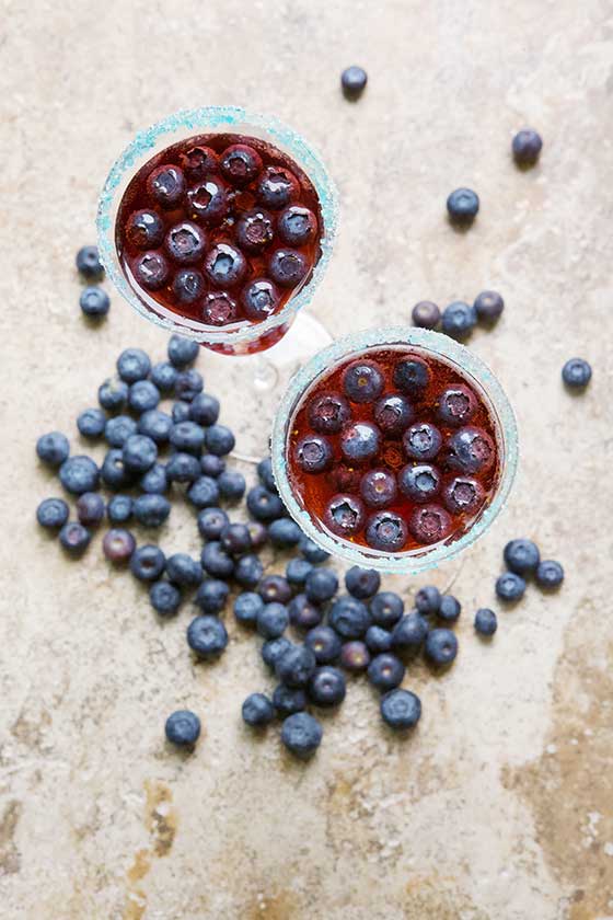 Make this delicious Blueberry and Bubbles Punch recipe for New Year's Eve, only a few ingredients make this the perfect cocktail! MarlaMeridith.com