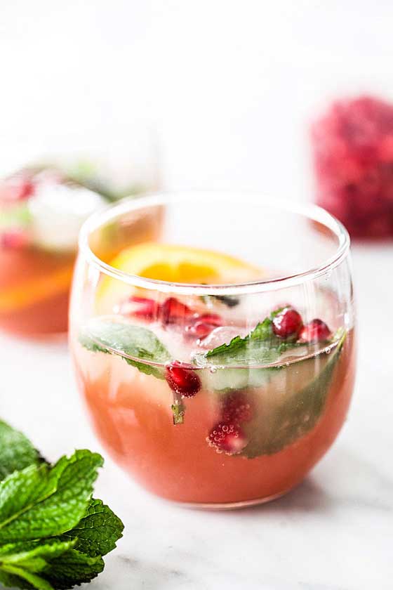 Pomegranate and Orange Champagne Punch recipe by foodiecrush.com GREAT for NYE!
