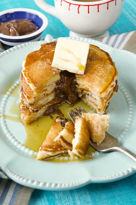 You can't say no to these Completely Delicious Nutella Stuffed Pancakes! The recipe is really fun to prepare and even more fun to eat. Serve for any breakfast or brunch! MarlaMeridith.com