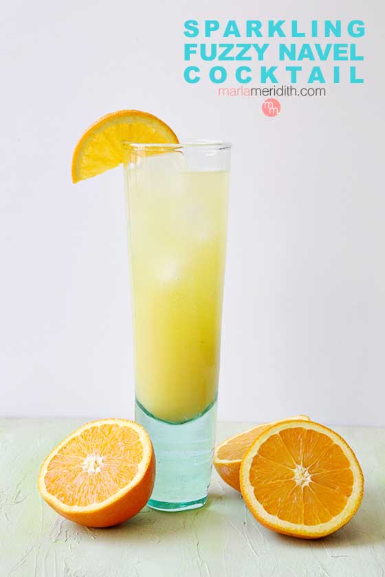 Only 3 ingredients make this SPARKLING FUZZY NAVEL COCKTAIL a total WIN! Get the recipe on MarlaMeridith.com