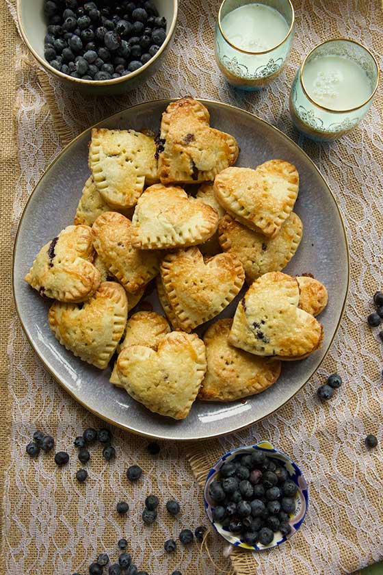 We are completely smitten with these Blueberry Pie Cookies. This recipe is great for entertaining and it will assure you don't eat the entire pie! MarlaMeridith.com