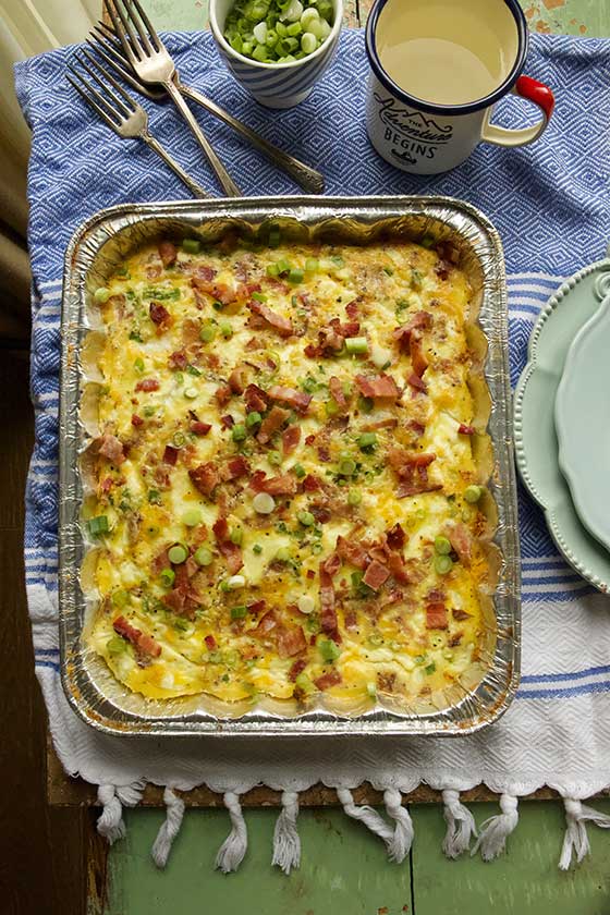 Looking for a new breakfast, brunch & potluck recipe? Look no further than this simple and delicious Bacon, Egg & Cheddar Cheese Breakfast Casserole recipe. MarlaMeridith.com