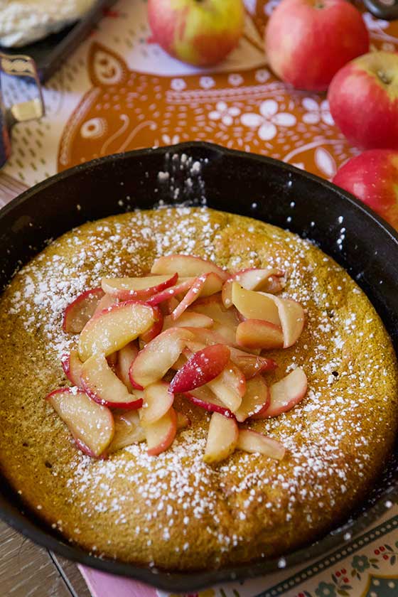 Taste the beautiful days of fall with this Cast Iron Skillet Pumpkin Dutch Baby with Caramelized Apples recipe. Delicious and so easy to prepare! Great for breakfast, brunch or any time at all! MarlaMeridith.com